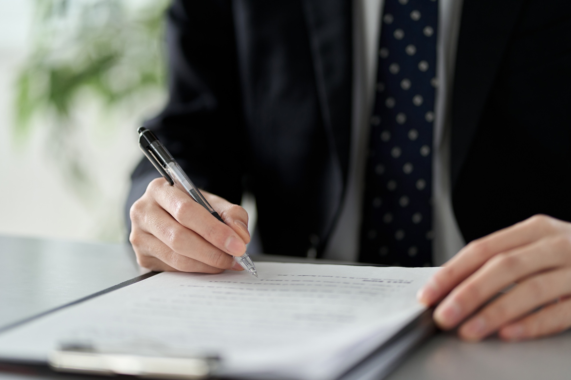 Asian businessman checking the content of documents